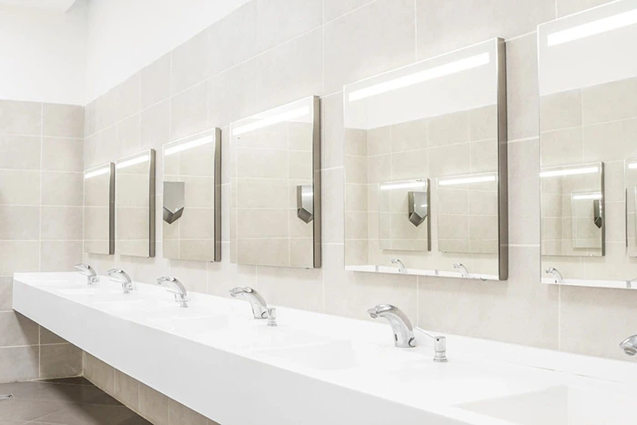 Newly installed row of sinks in public restroom
