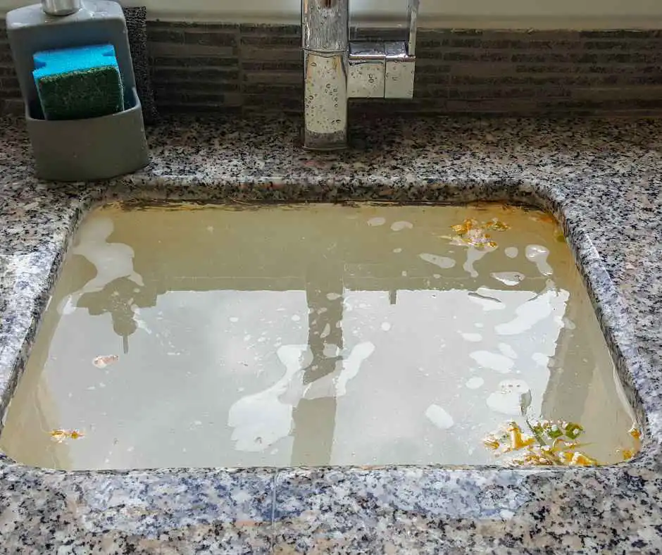 Clogged kitchen drain causing a backup